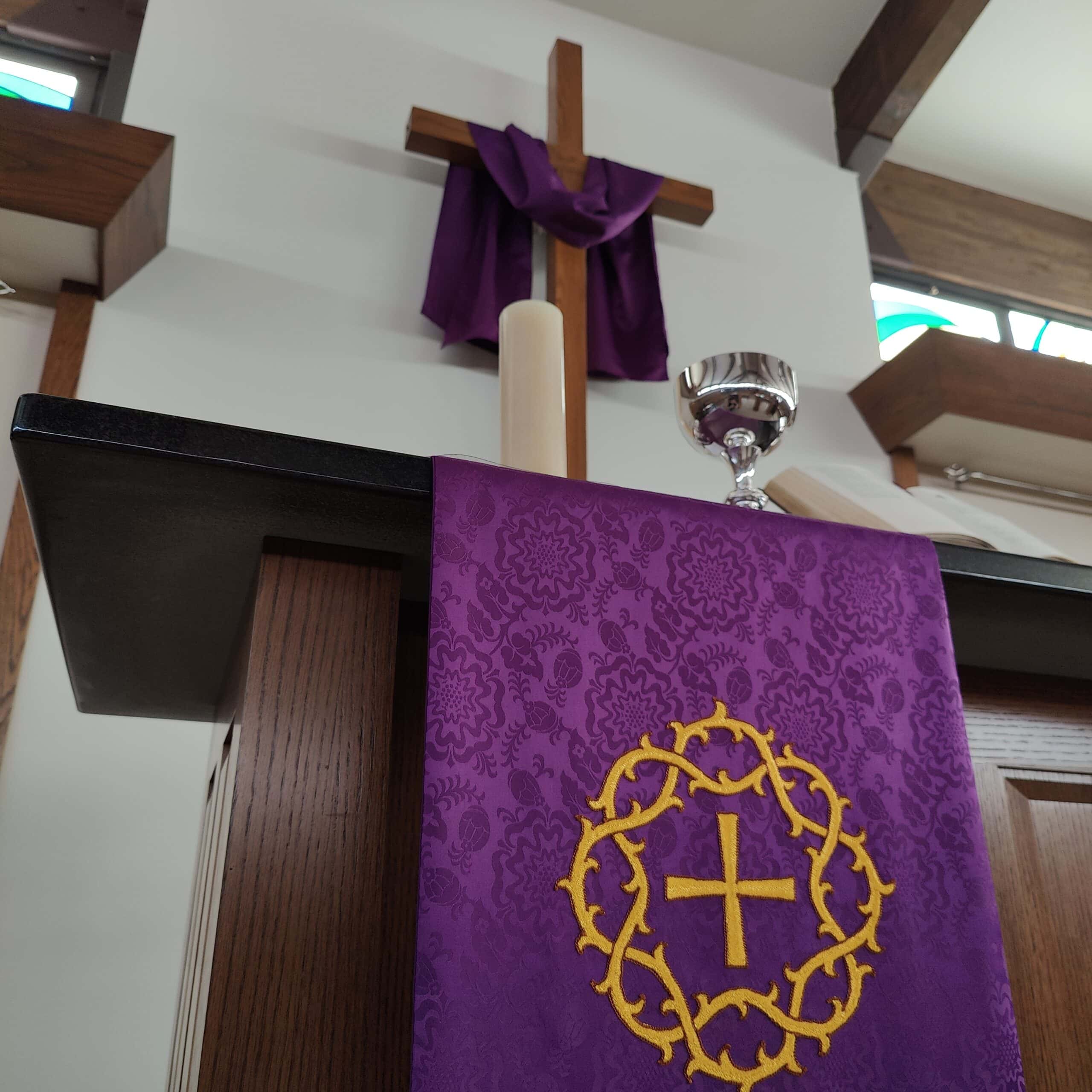 Altar and cross at Peace With Christ Lutheran Church in Fort Collins, CO