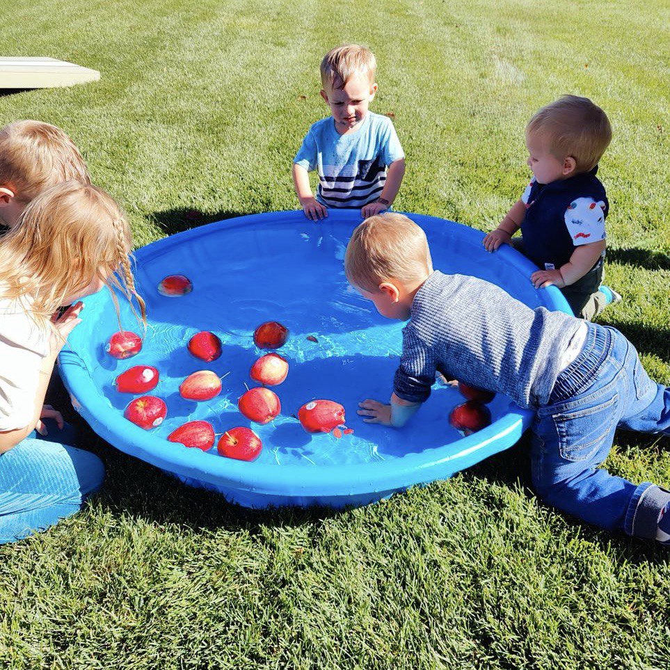 Children bobbing for apples at Peace With Christ Lutheran Church in Fort Collins, CO