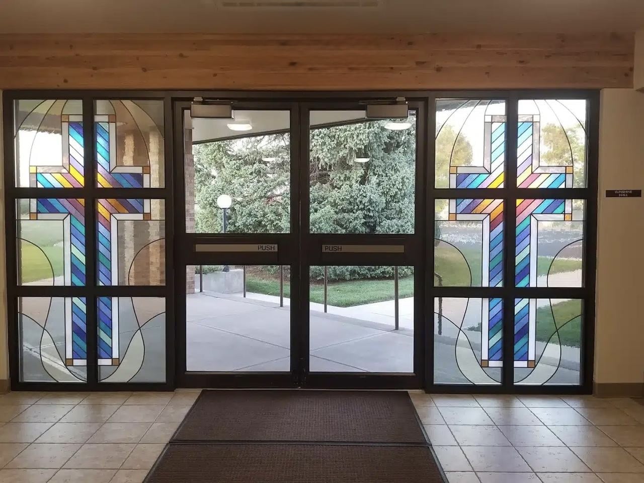 Front doors at Peace With Christ Lutheran Church in Fort Collins, CO